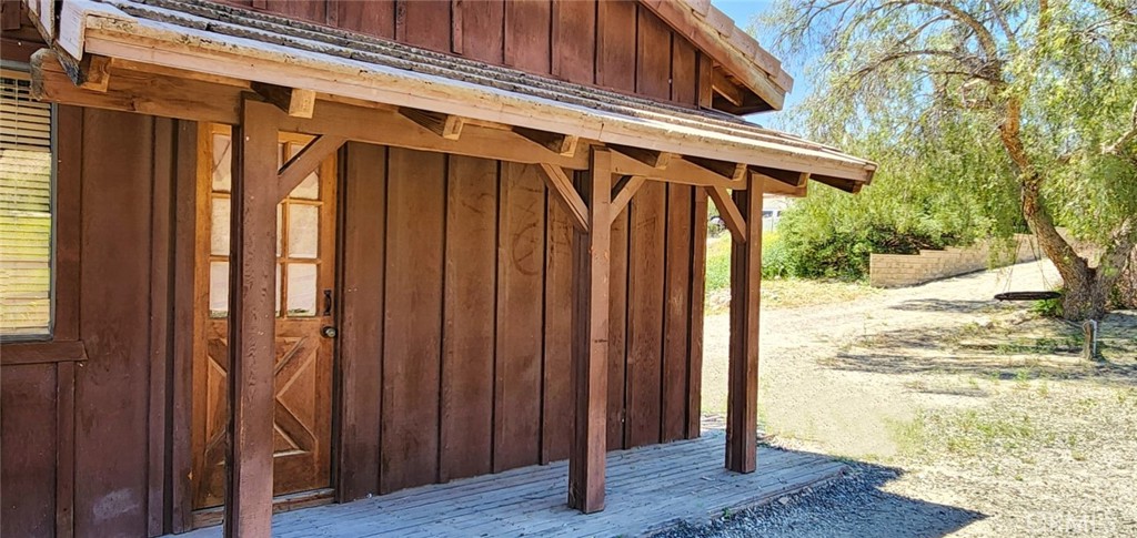 29932 Louis Avenue Canyon Country, CA 91351 - Photo 33 of 46 a view of a house with a wooden door