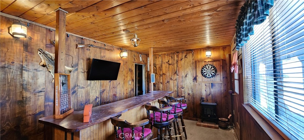 29932 Louis Avenue Canyon Country, CA 91351 - Photo 34 of 46 a living room with furniture and a flat screen tv