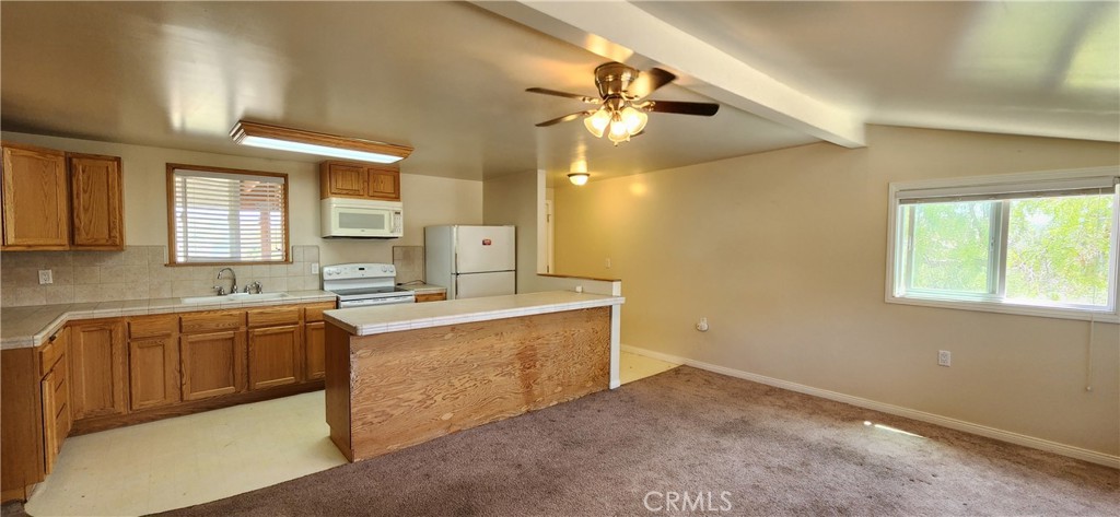 29932 Louis Avenue Canyon Country, CA 91351 - Photo 38 of 46 a large kitchen with a large window