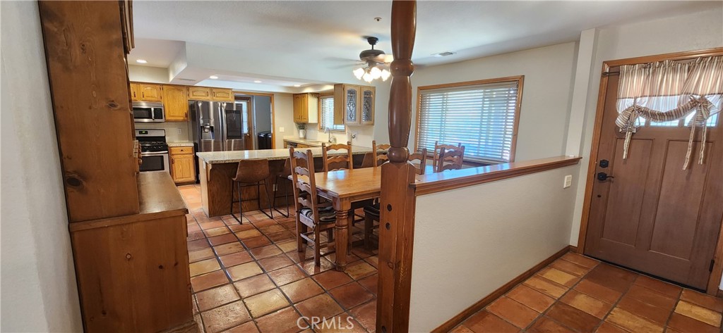 29932 Louis Avenue Canyon Country, CA 91351 - Photo 4 of 46 a view of a dining room with furniture window and outside view