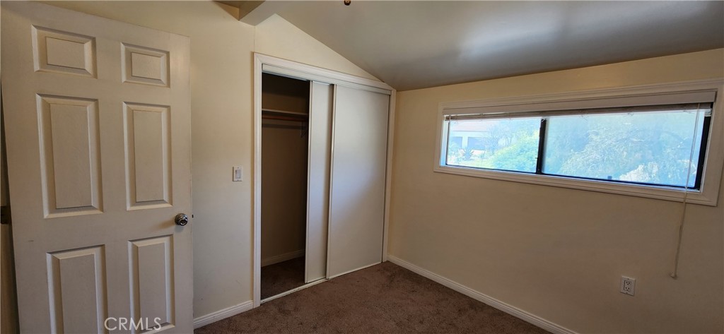 29932 Louis Avenue Canyon Country, CA 91351 - Photo 42 of 46 an empty room with windows