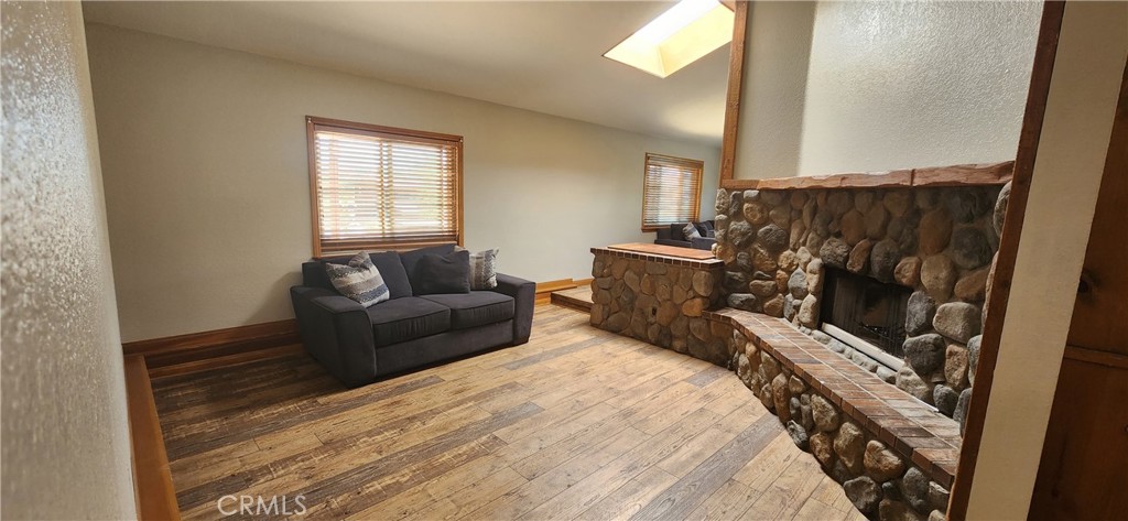 29932 Louis Avenue Canyon Country, CA 91351 - Photo 5 of 46 a bedroom with a bed a couch and dresser