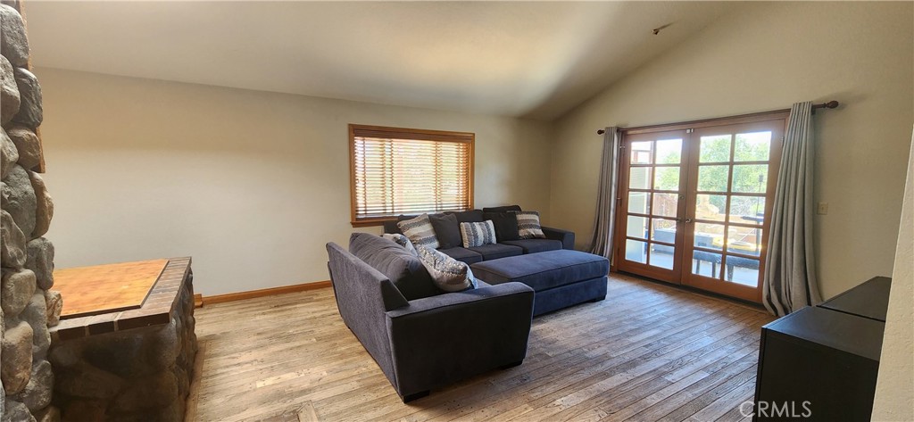 29932 Louis Avenue Canyon Country, CA 91351 - Photo 9 of 46 a living room with furniture and a window