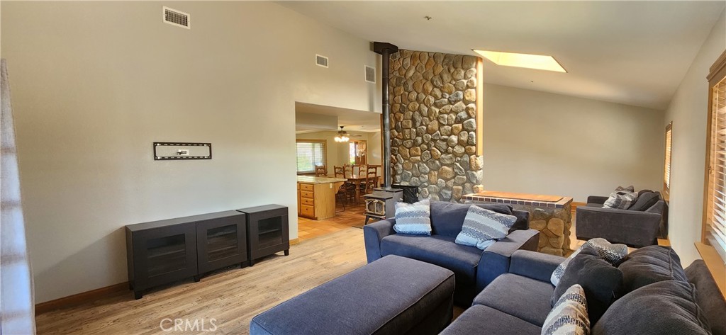 29932 Louis Avenue Canyon Country, CA 91351 - Photo 10 of 46 a living room with furniture and a couch