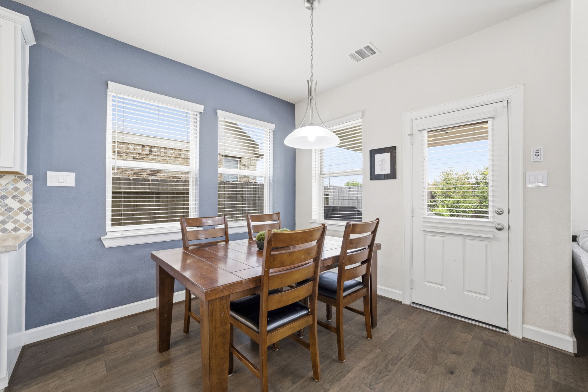 7618 Trailing Oaks Drive Spring, TX 77379 - Photo 12 of 33 a dining room with furniture and window
