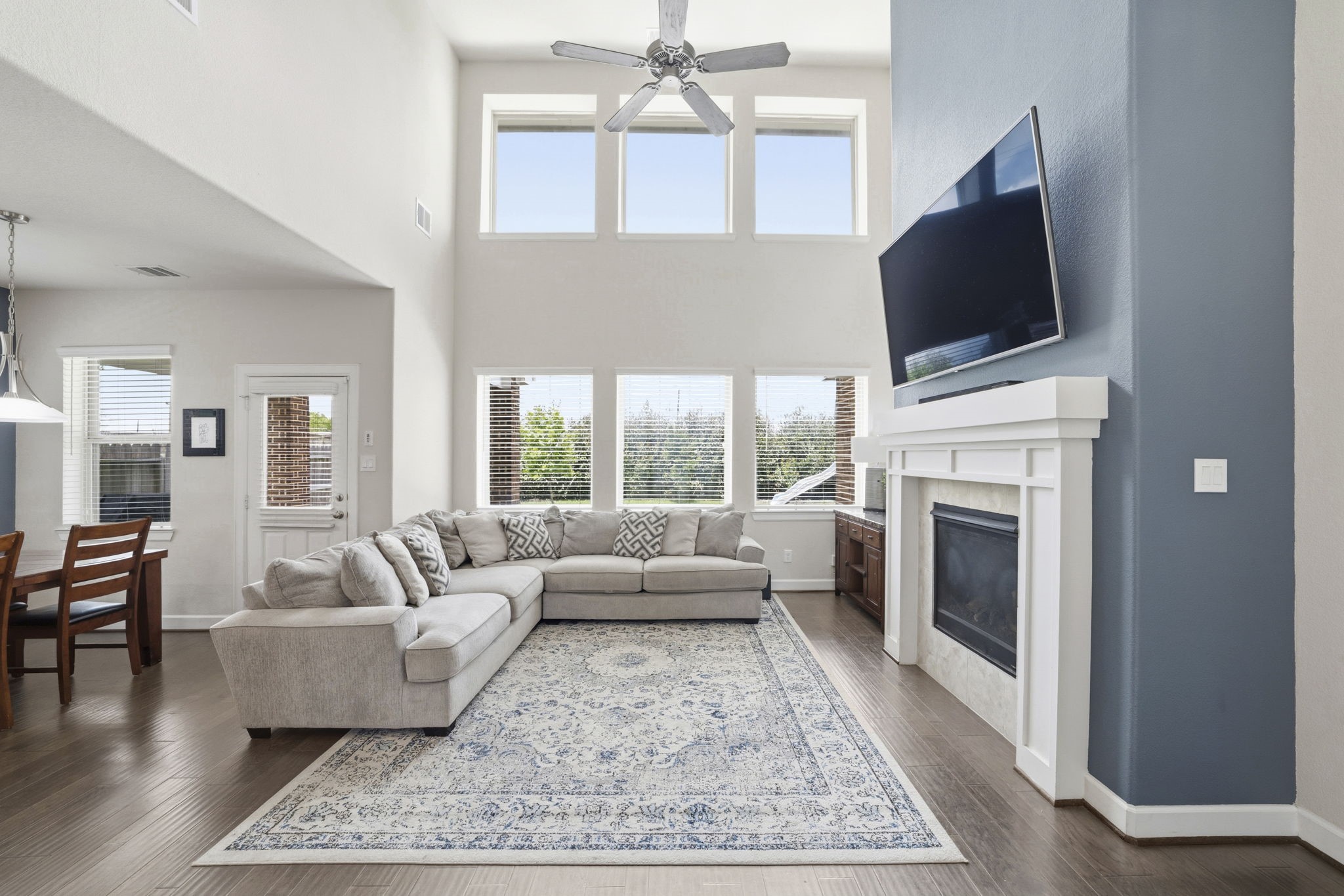 7618 Trailing Oaks Drive Spring, TX 77379 - Photo 14 of 33 a living room with furniture fireplace and flat screen tv