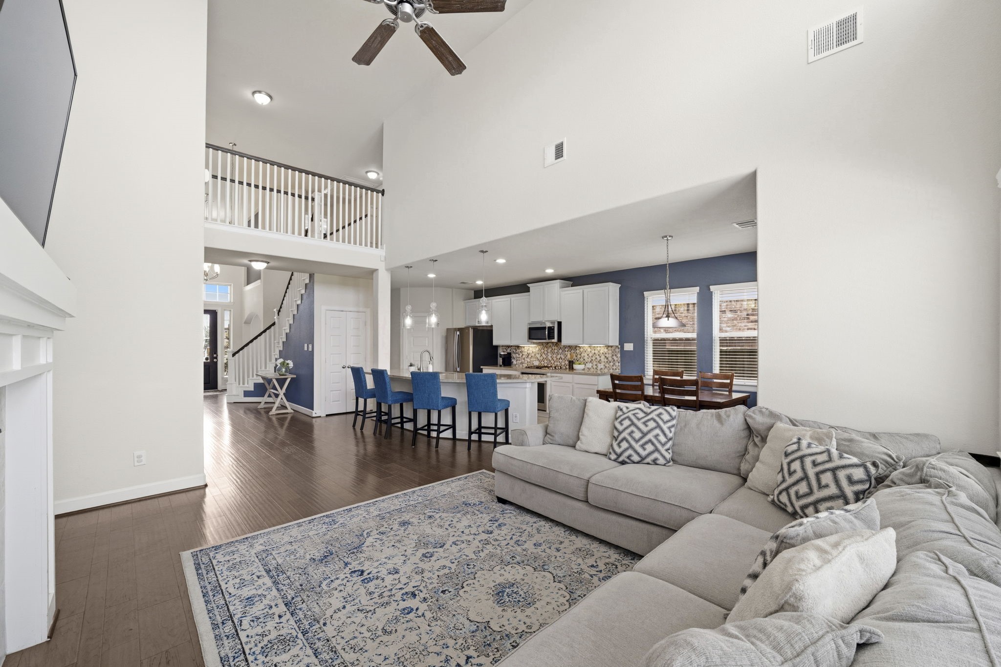 7618 Trailing Oaks Drive Spring, TX 77379 - Photo 15 of 33 a living room with furniture and a rug