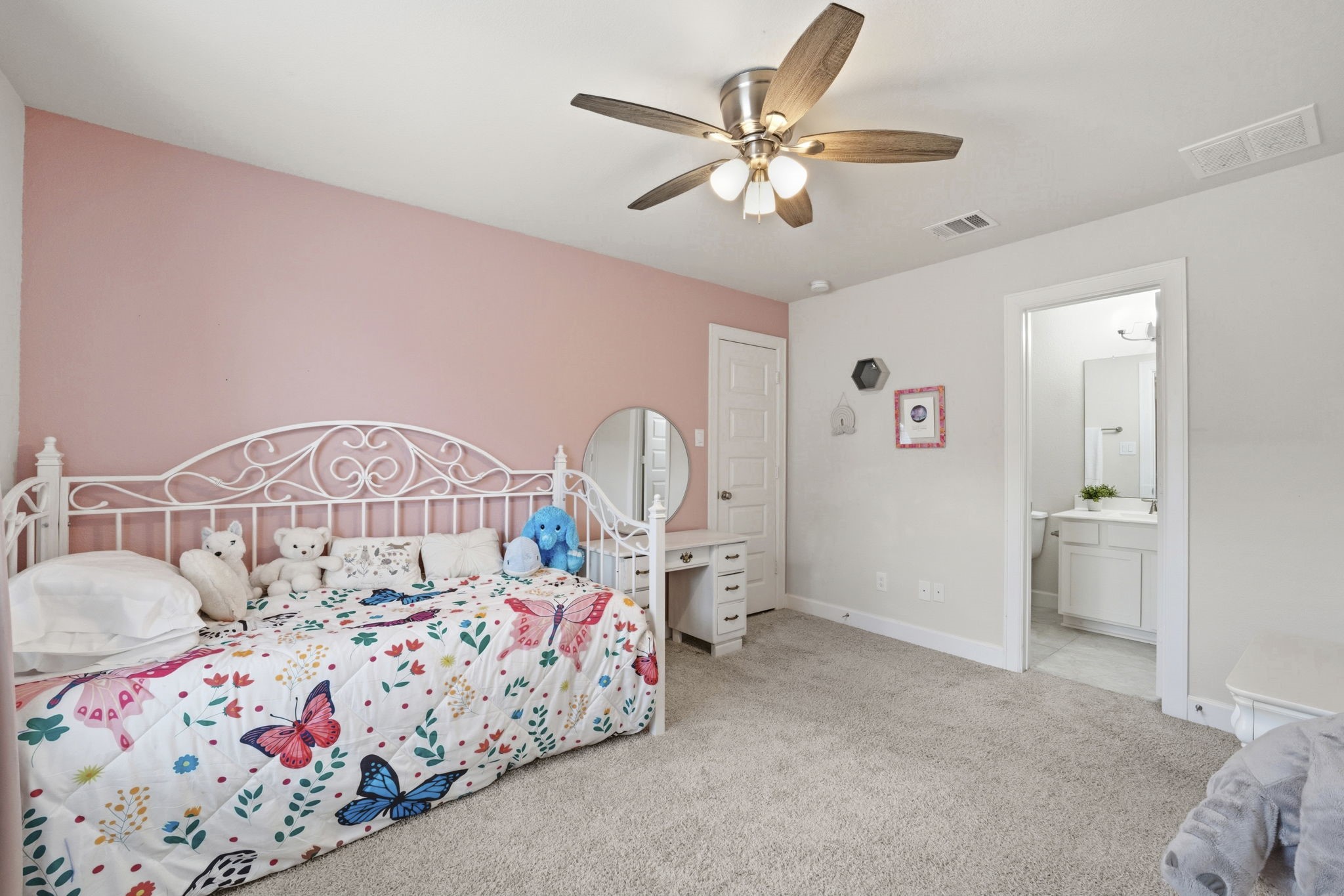 7618 Trailing Oaks Drive Spring, TX 77379 - Photo 25 of 33 a bedroom with furniture and a large window