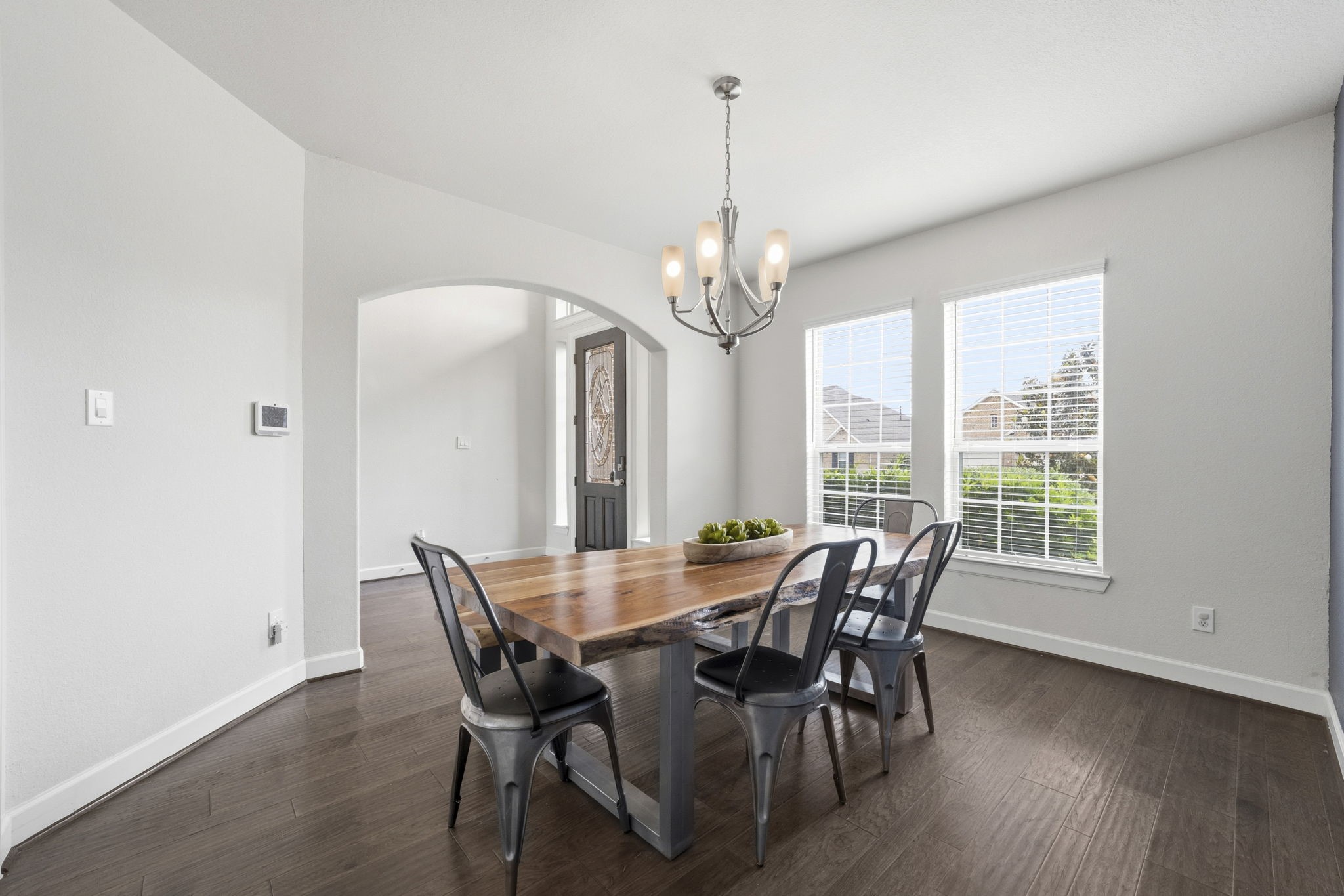 7618 Trailing Oaks Drive Spring, TX 77379 - Photo 5 of 33 a view of a dining room with furniture window and wooden floor