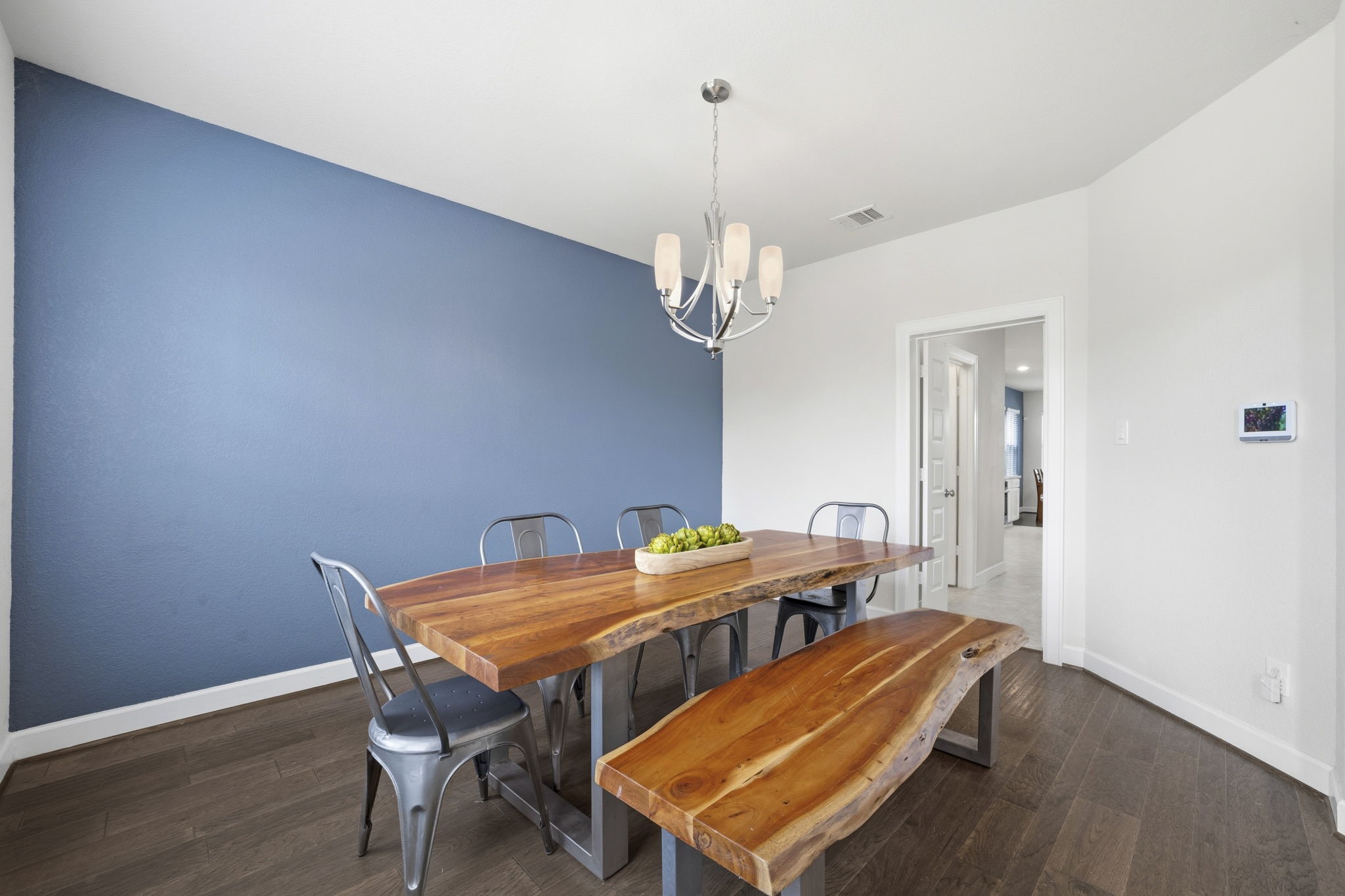 7618 Trailing Oaks Drive Spring, TX 77379 - Photo 6 of 33 a view of a dining room with furniture and wooden floor
