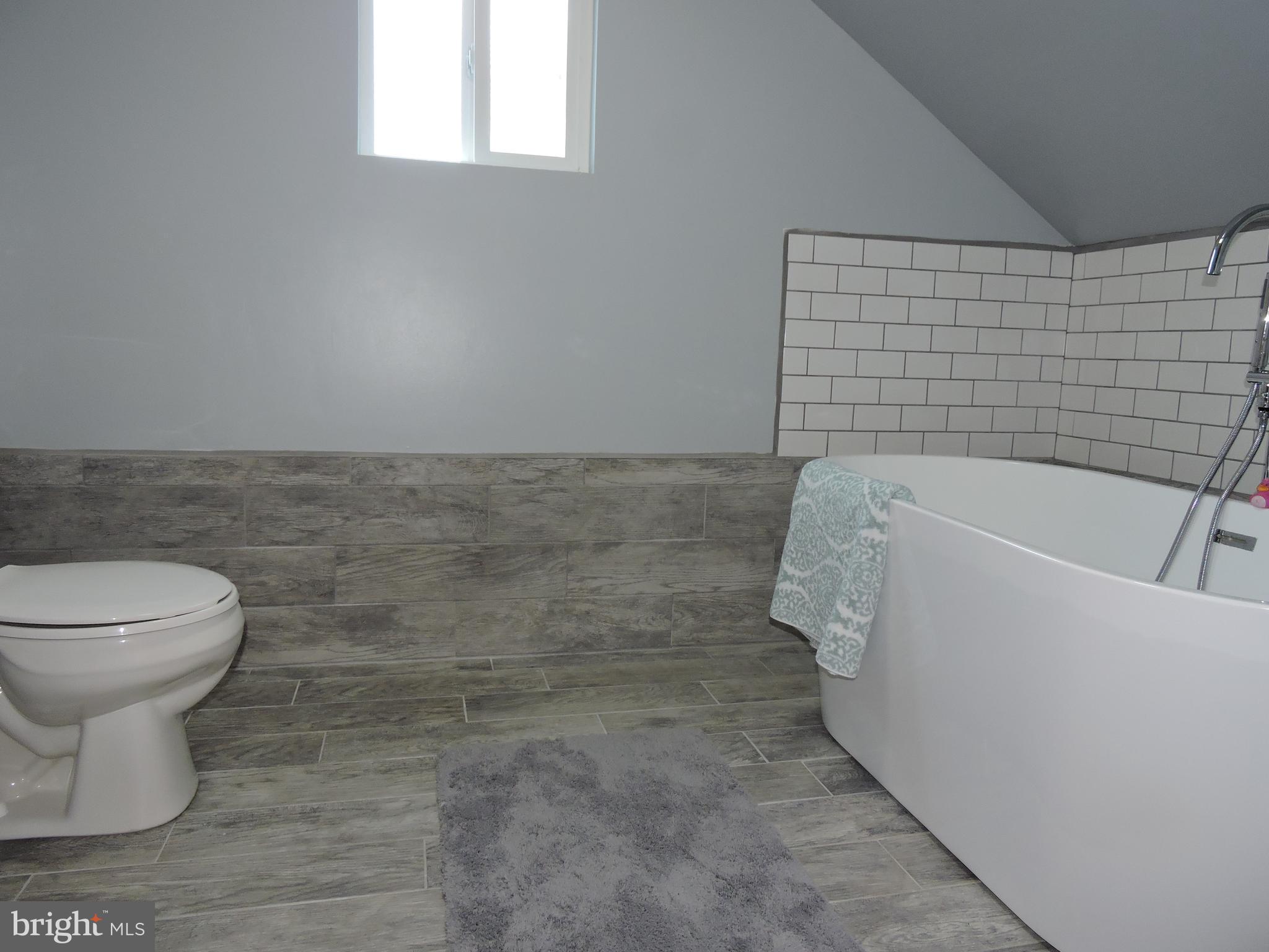 7609 Maple Road Baltimore, MD 21222 - Photo 24 of 41 New 2nd floor bath with stunning soaking tub
