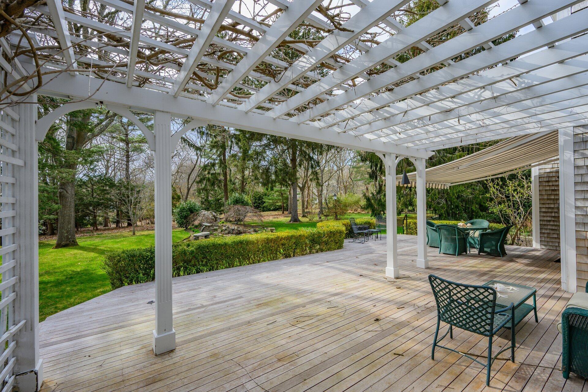 81 Osterville West Barnstable Road Osterville, MA 02655 - Photo 33 of 41 a patio with yard table and chairs