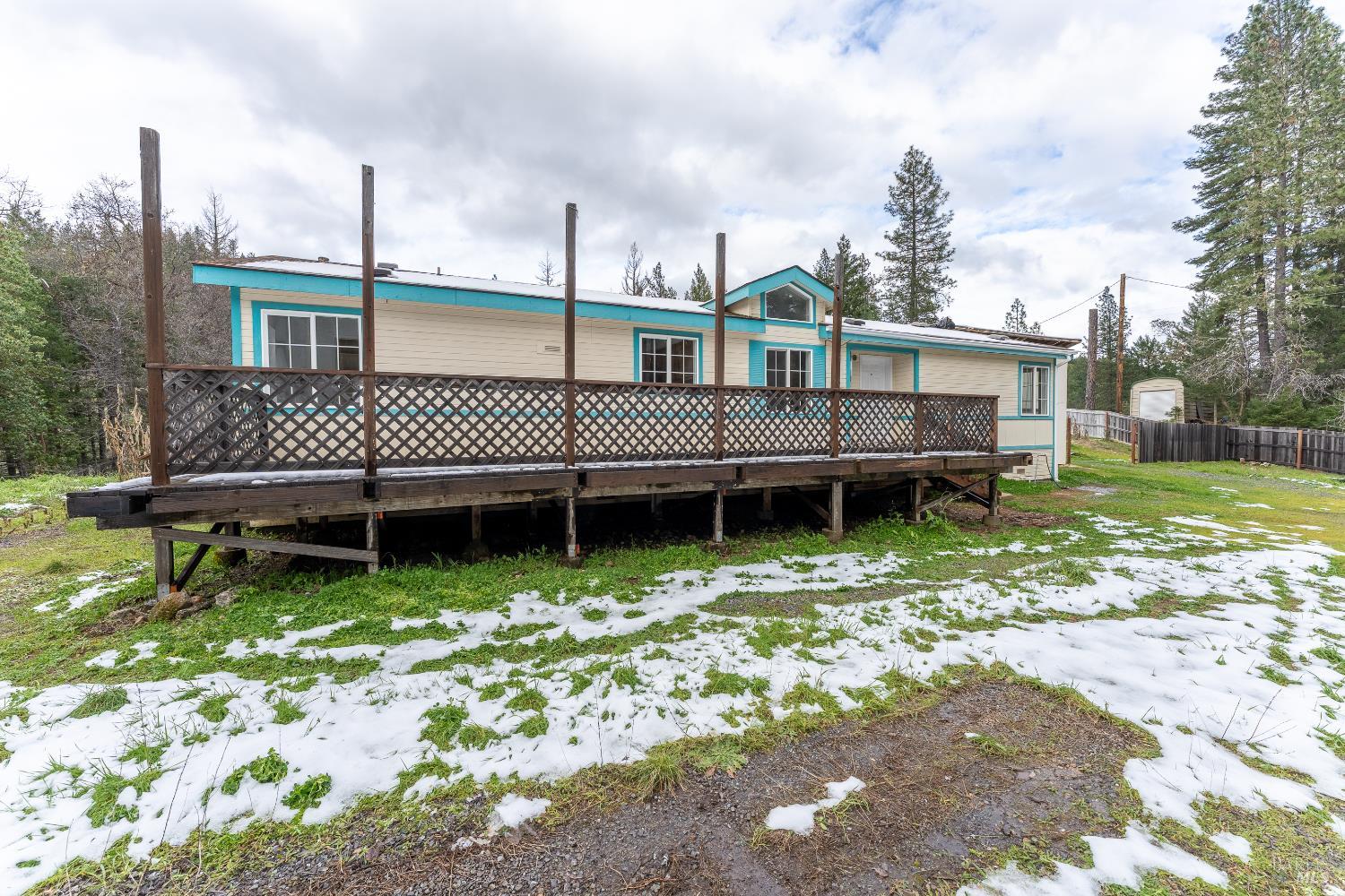 5751 Ridgewood Road Willits, CA 95490 - Photo 2 of 27 a view of a house with a yard