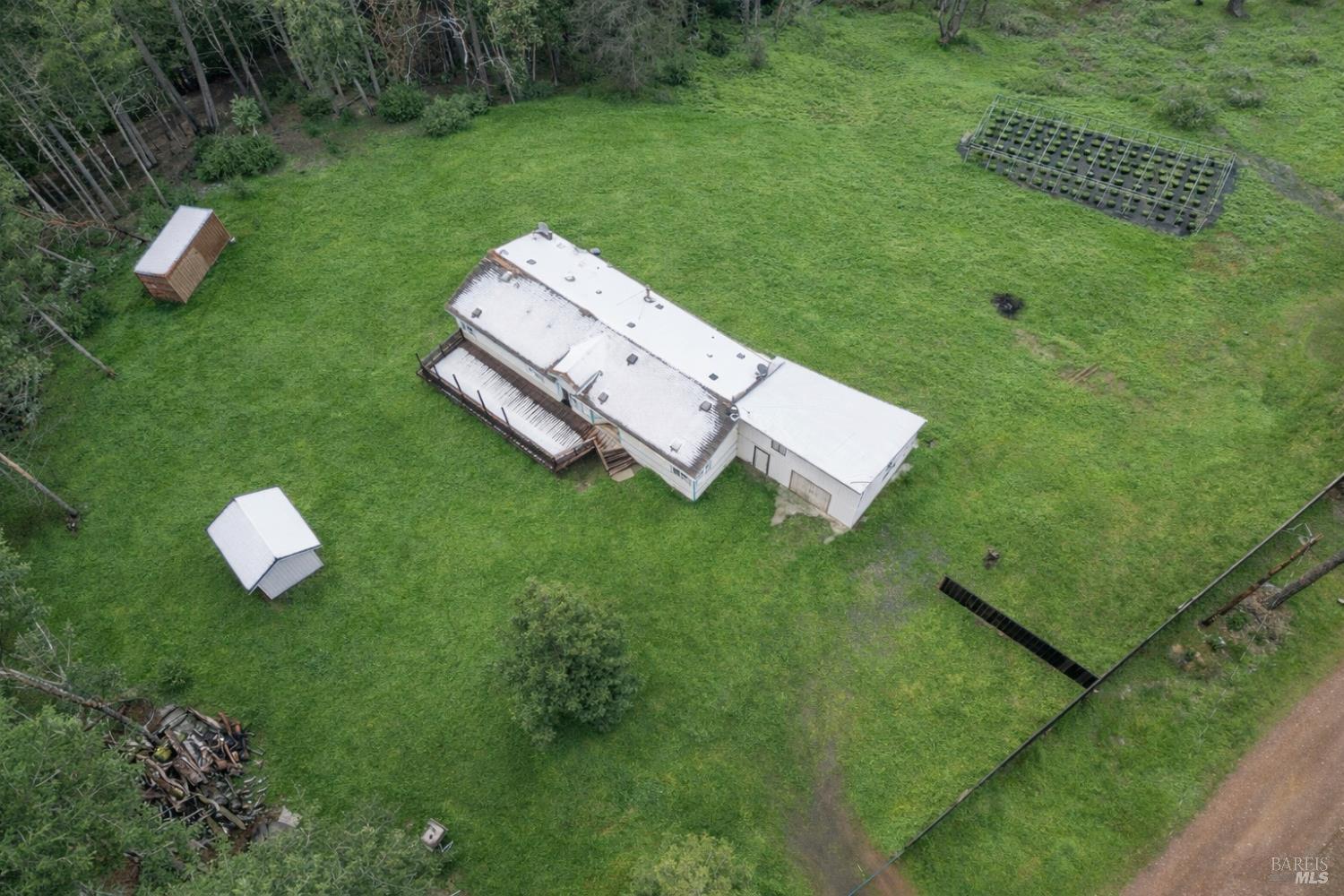 5751 Ridgewood Road Willits, CA 95490 - Photo 27 of 27 a view of a golf course with a wooden fence