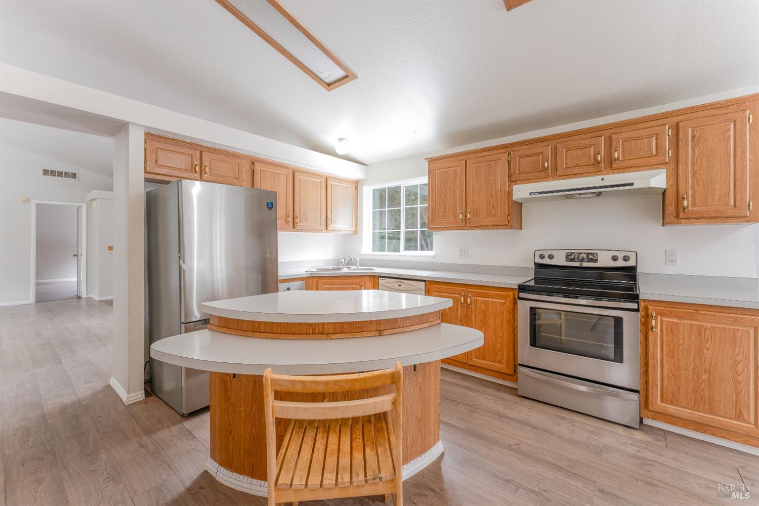 5751 Ridgewood Road Willits, CA 95490 - Photo 3 of 27 a kitchen with stainless steel appliances granite countertop a stove a refrigerator and a refrigerator