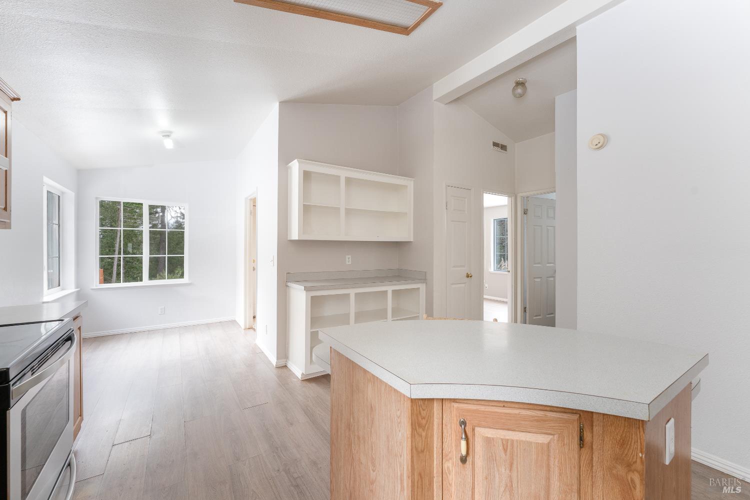 5751 Ridgewood Road Willits, CA 95490 - Photo 9 of 27 a view of a kitchen cabinets and wooden floor