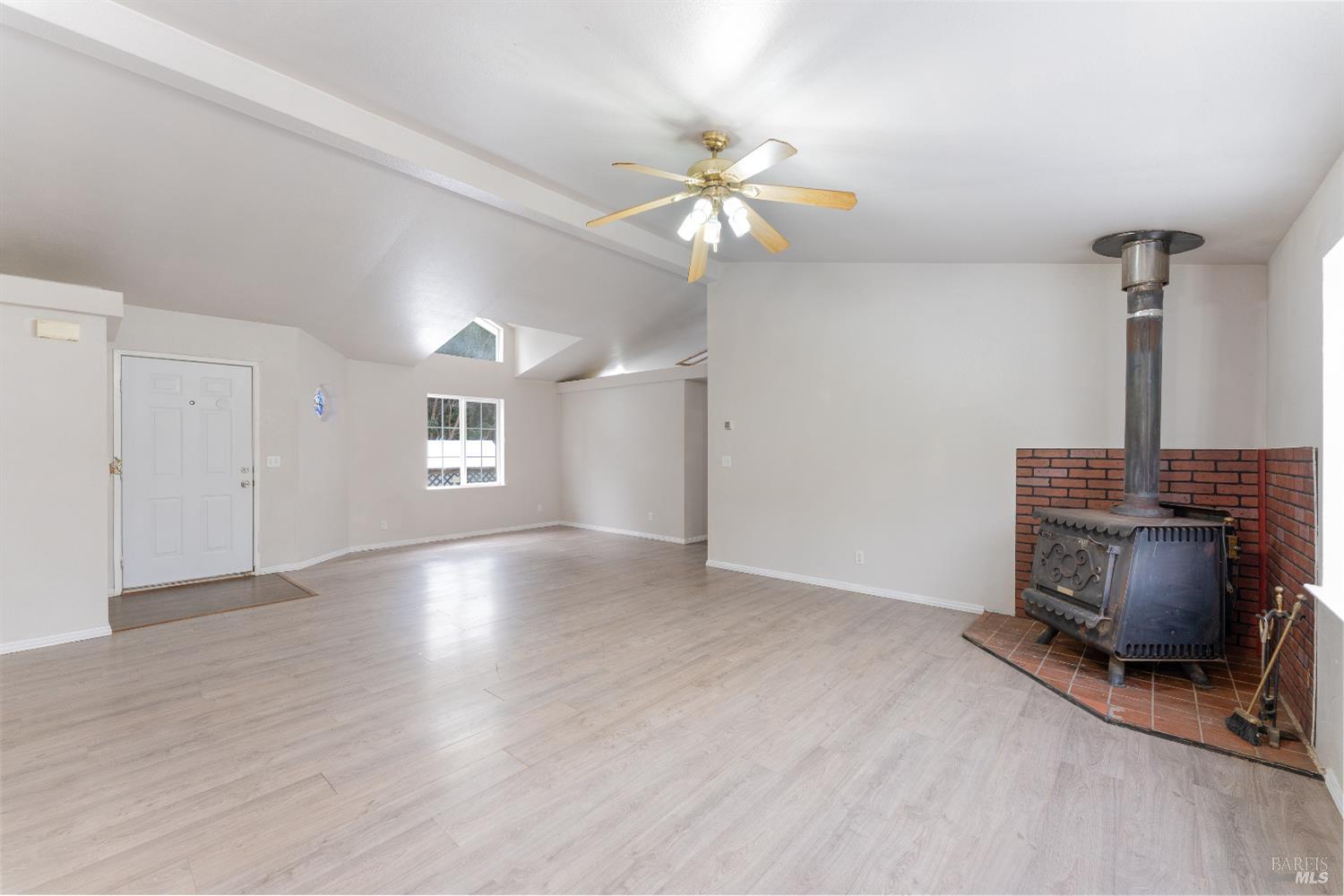 5751 Ridgewood Road Willits, CA 95490 - Photo 10 of 27 a view of workspace with a window and a chandelier fan