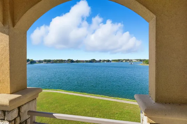 a view of a swimming pool with an outdoor seating
