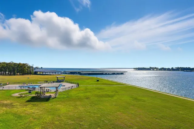 a view of a lake with a city