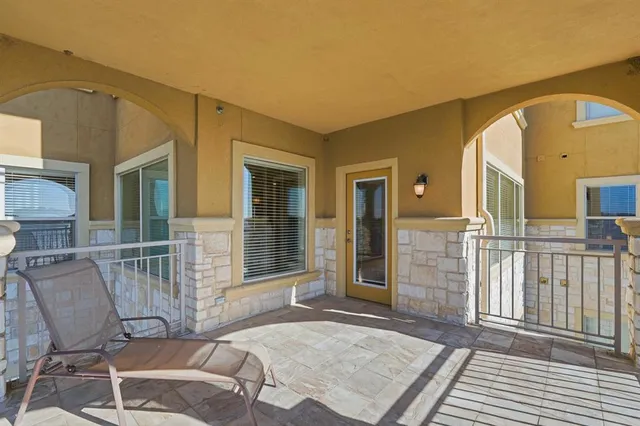 a view of a house with a chairs