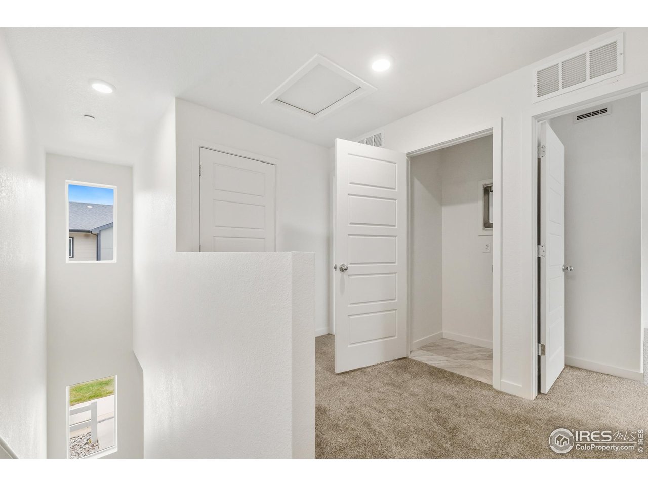 3912 Net Street Evans, CO 80620 - Photo 6 of 19 a room with closet and mirror