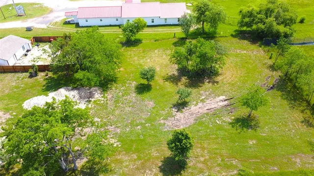a view of a lake with a building in the background