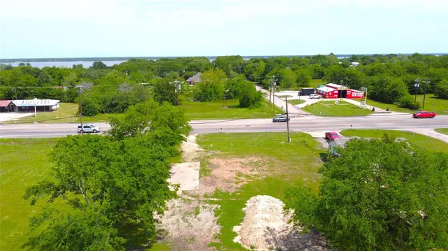a lush green field with lots of golf course