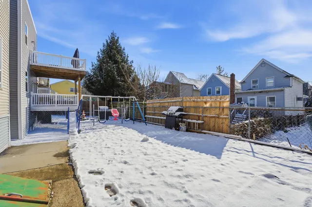 a car parked in front of a house