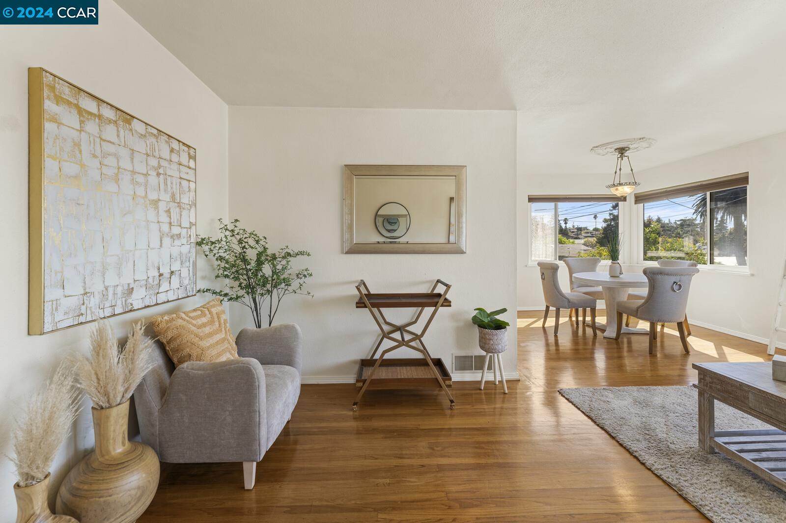 Undisclosed Address Richmond, CA 94805 - Photo 14 of 47 a living room with furniture and wooden floor