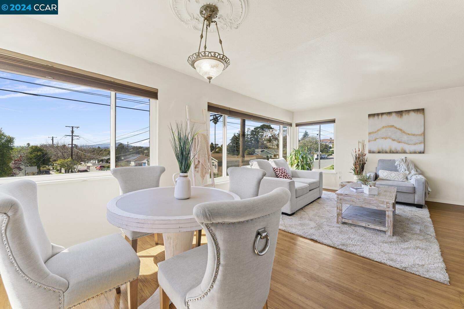 Undisclosed Address Richmond, CA 94805 - Photo 16 of 47 a living room with furniture and a large window