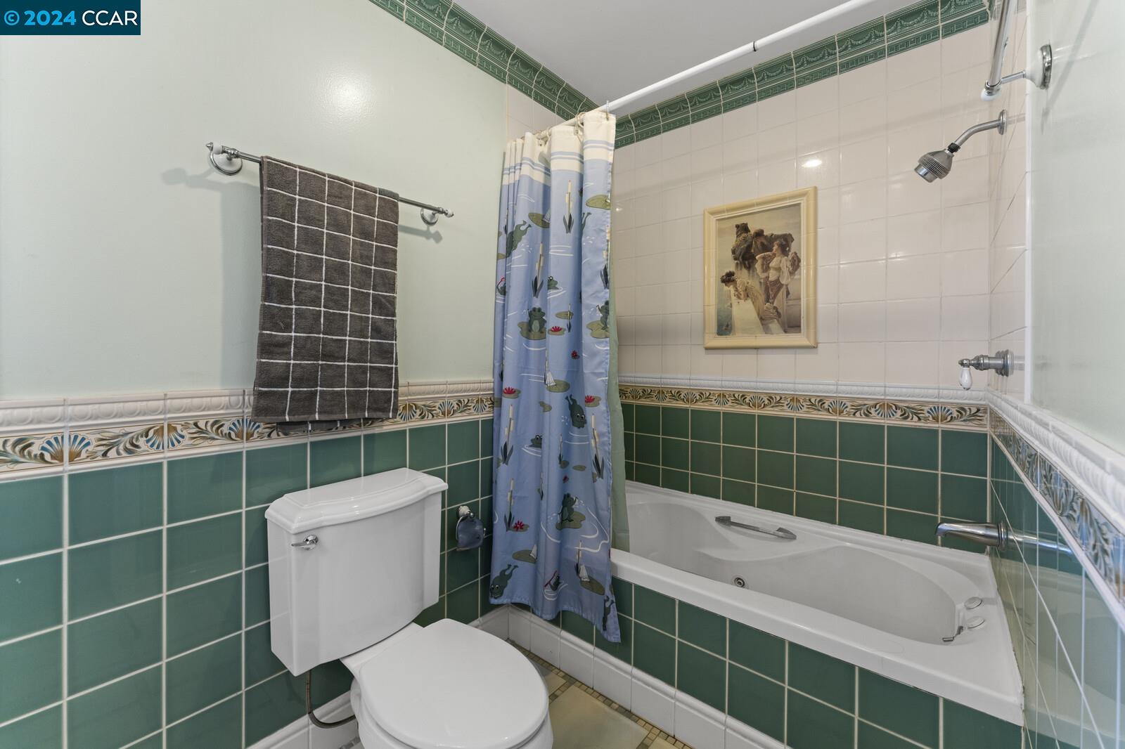 Undisclosed Address Richmond, CA 94805 - Photo 24 of 47 a bathroom with a toilet sink and shower