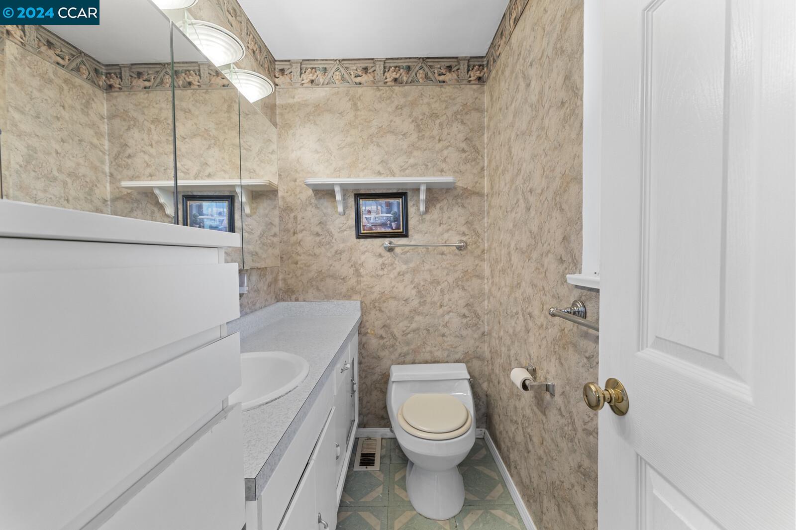 Undisclosed Address Richmond, CA 94805 - Photo 29 of 47 a bathroom with a toilet and a shower