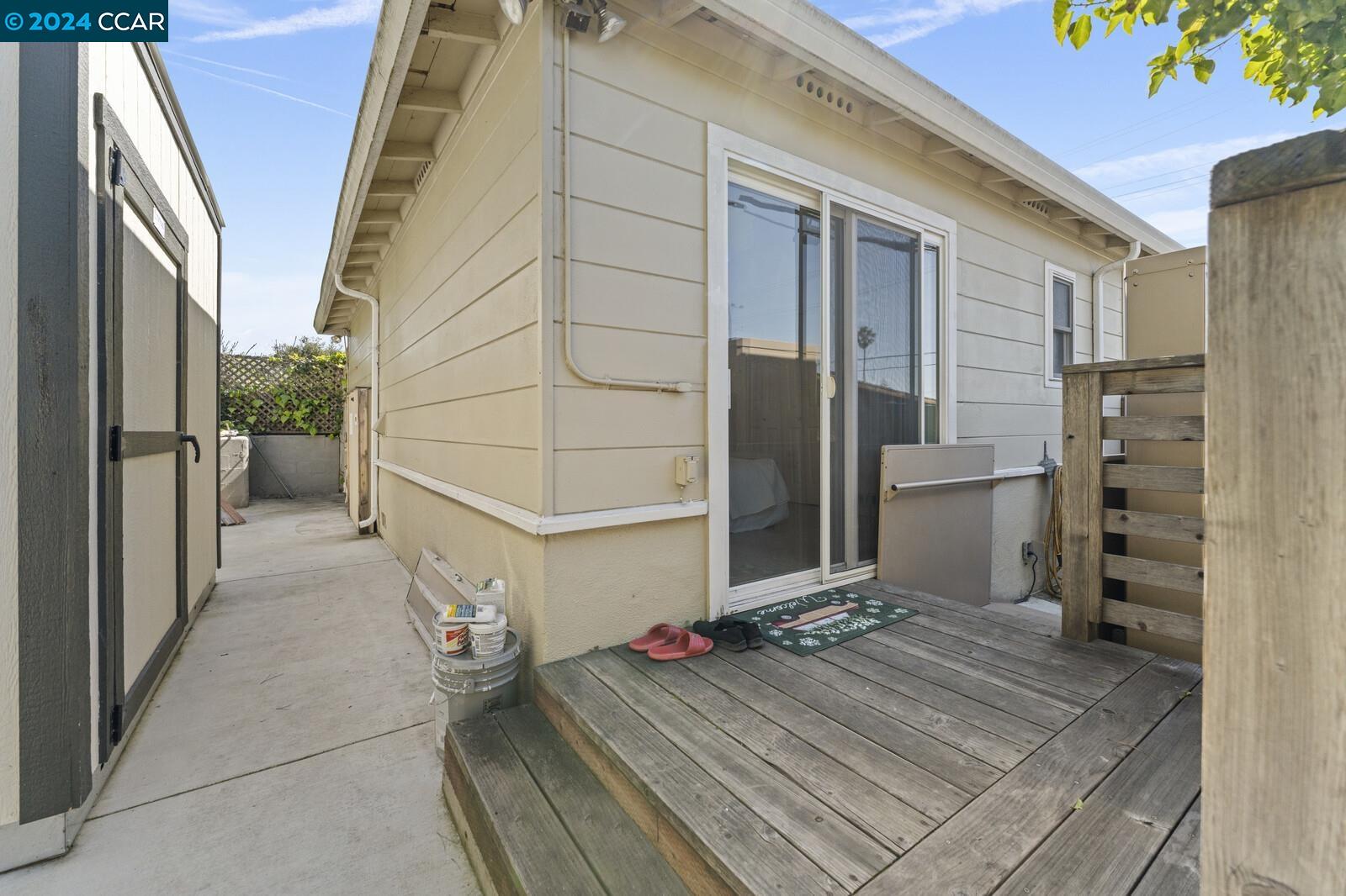Undisclosed Address Richmond, CA 94805 - Photo 39 of 47 a view of a balcony a refrigerator and a stove