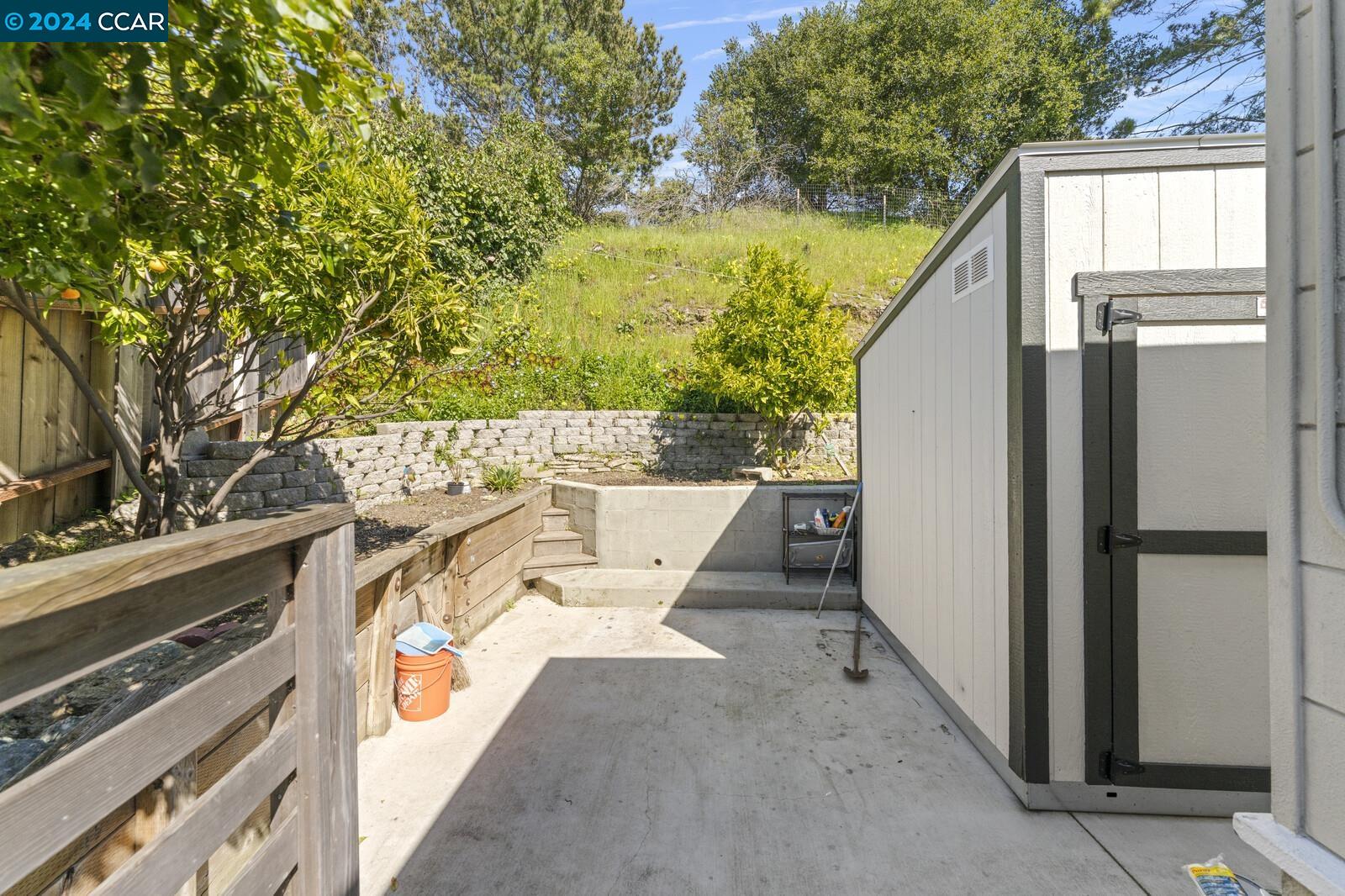 Undisclosed Address Richmond, CA 94805 - Photo 40 of 47 a view of a room with a sink and wooden floor