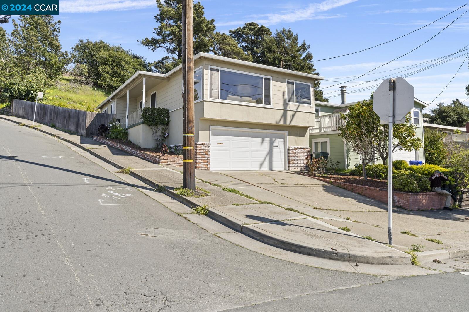 Undisclosed Address Richmond, CA 94805 - Photo 5 of 47 a view of a house with a street