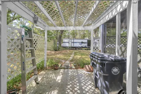 a view of a yard in the middle of a house