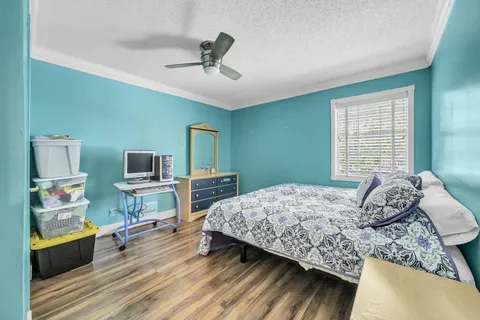 a bedroom with furniture and a bed