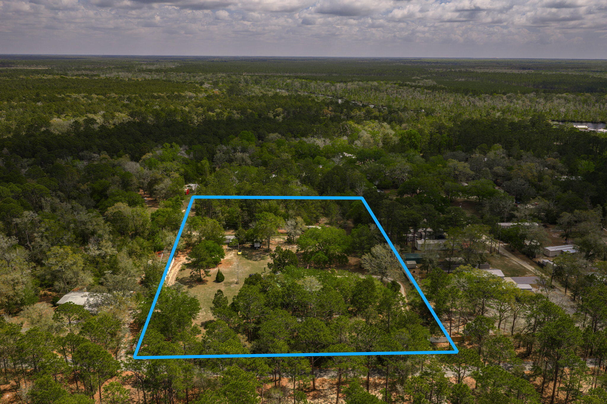 233 Altman Road Freeport, FL 32439 - Photo 3 of 64 68-web-or-mls-DJI_20260330123329_0912_D-