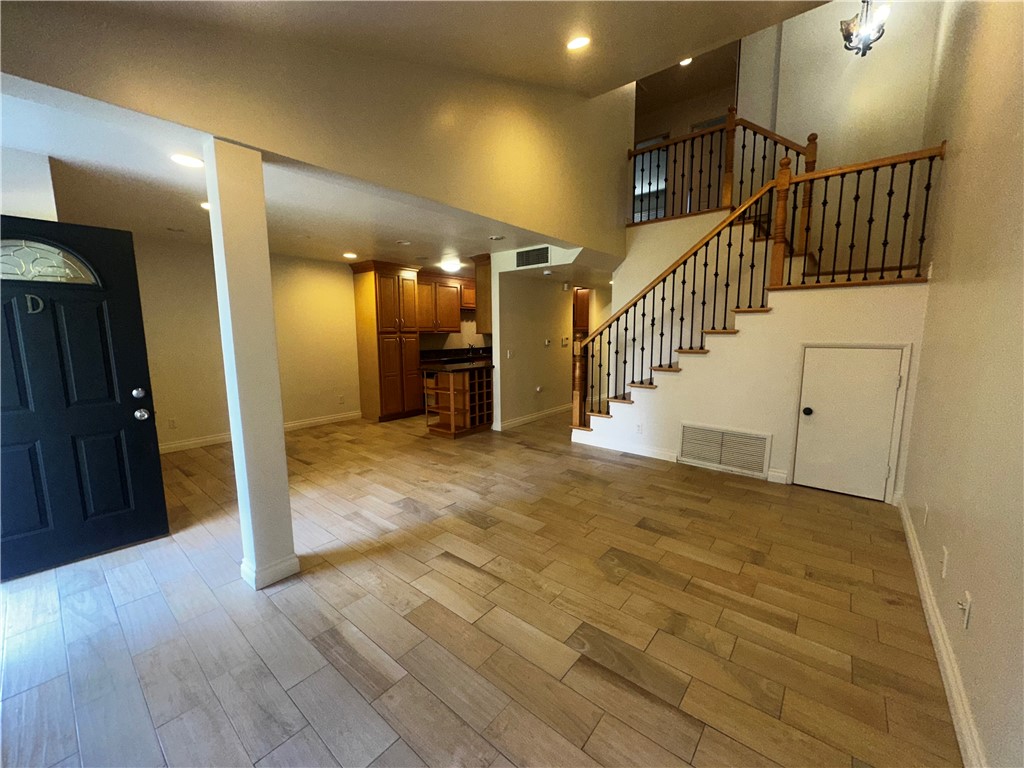9356 19th Street, Unit D Rancho Cucamonga, CA 91701 - Photo 5 of 16 a view of a hallway with a hallway