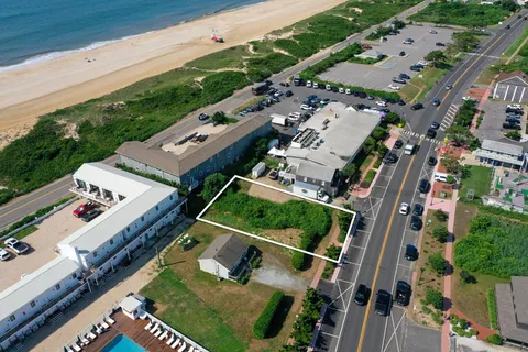 a view of a balcony with chairs