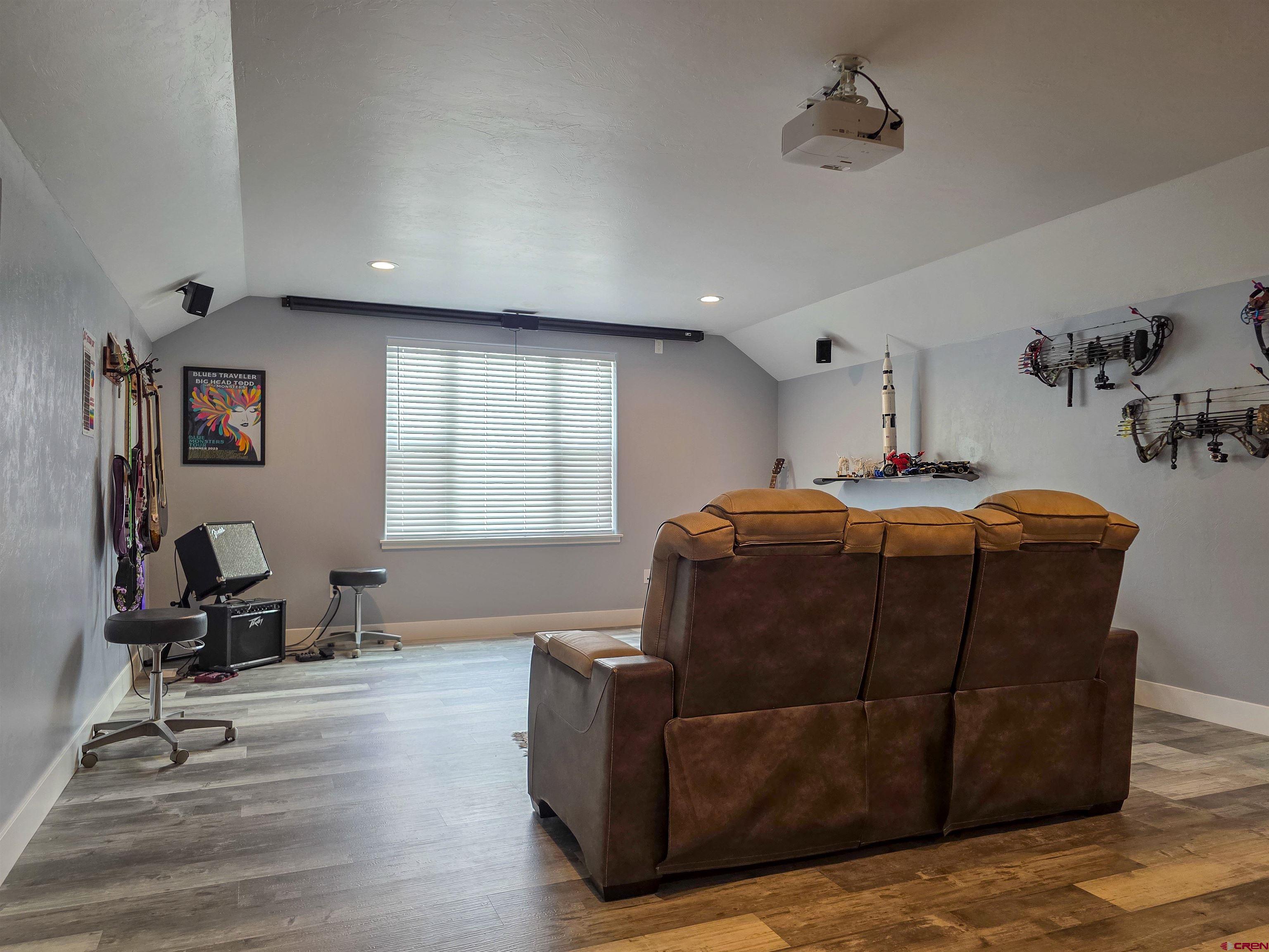 1771 Trappers Court Delta, CO 81416 - Photo 20 of 44 a bedroom with a bed and wooden floor
