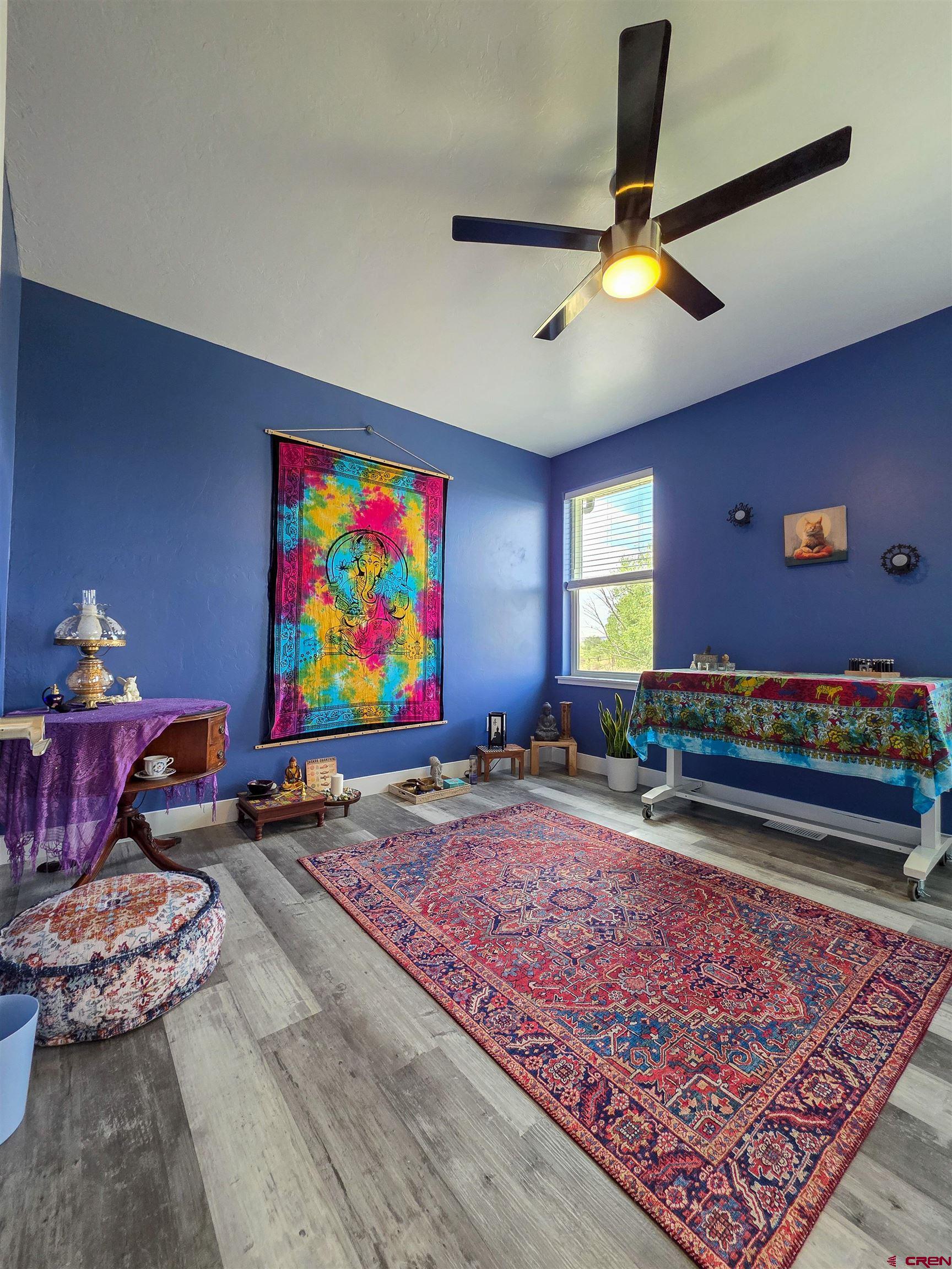 1771 Trappers Court Delta, CO 81416 - Photo 25 of 44 a living room with furniture and a rug