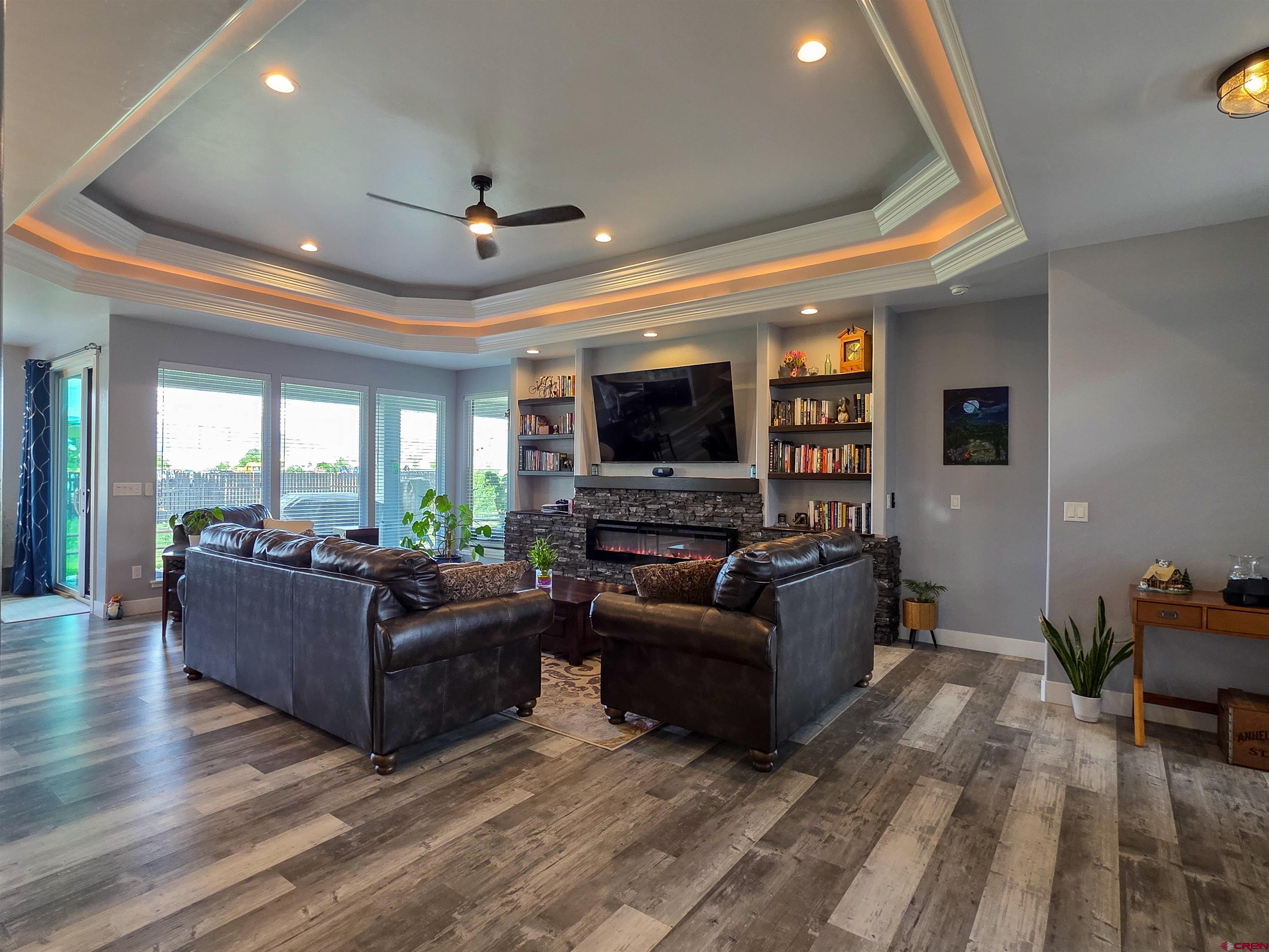 1771 Trappers Court Delta, CO 81416 - Photo 3 of 44 a living room with furniture and a flat screen tv
