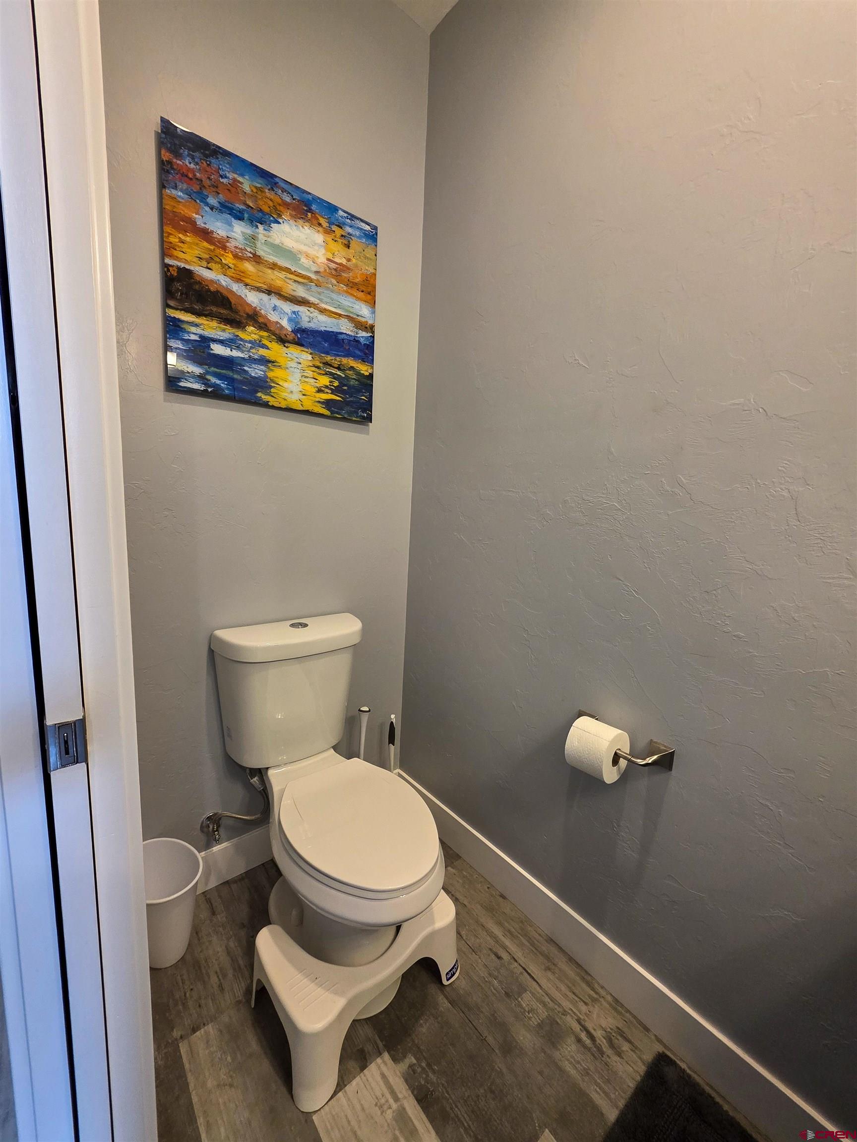 1771 Trappers Court Delta, CO 81416 - Photo 31 of 44 a white toilet sitting next to a small bathroom