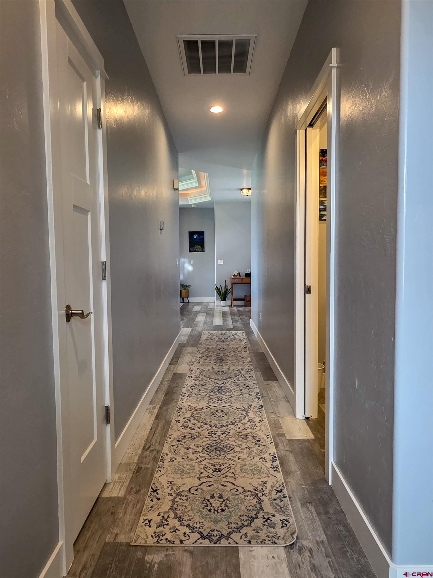 1771 Trappers Court Delta, CO 81416 - Photo 33 of 44 a view of a hallway with a livingroom and a bathroom