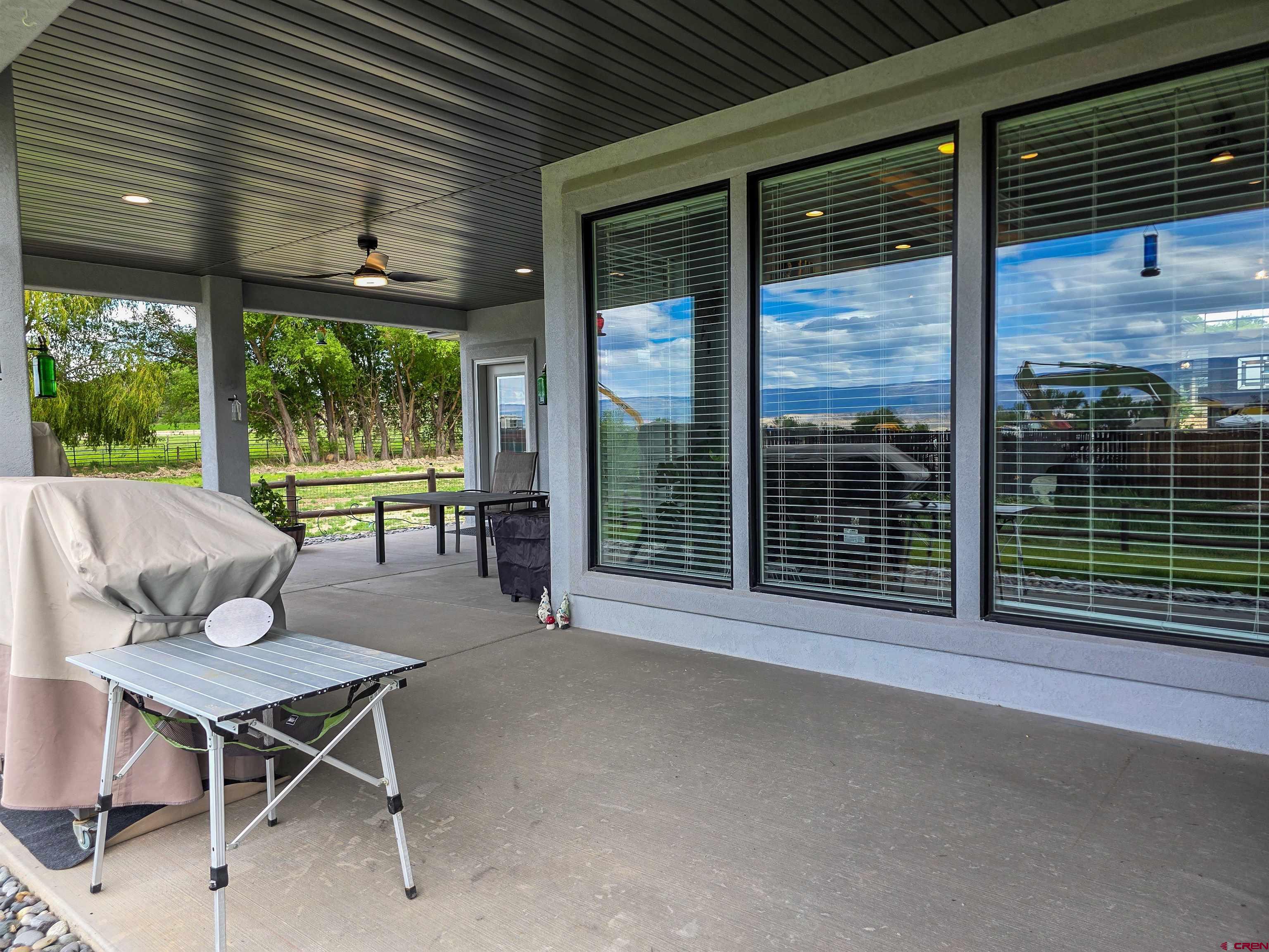 1771 Trappers Court Delta, CO 81416 - Photo 40 of 44 a view of a patio with a table and chairs
