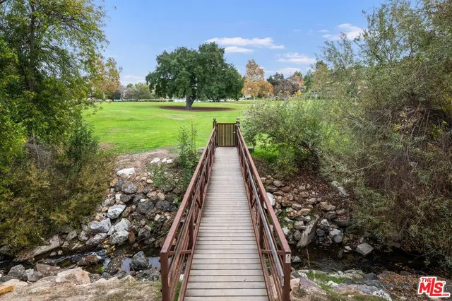 a view of a yard with an trees