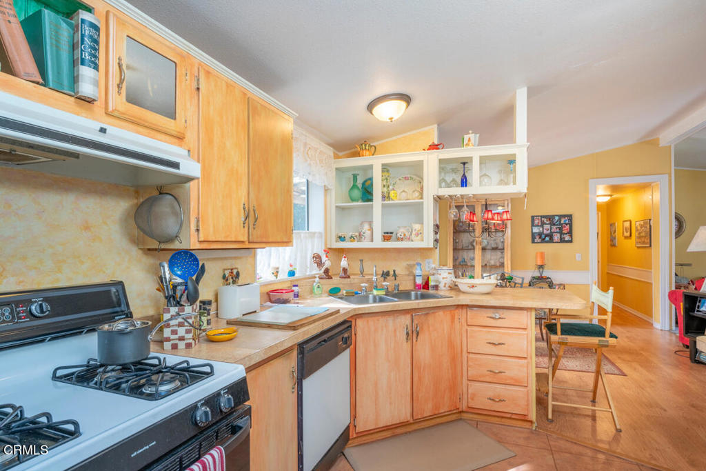 43300 Little River-Airport Road, Unit 90 Little River, CA 95456 - Photo 11 of 21 a kitchen with a sink stove and cabinets