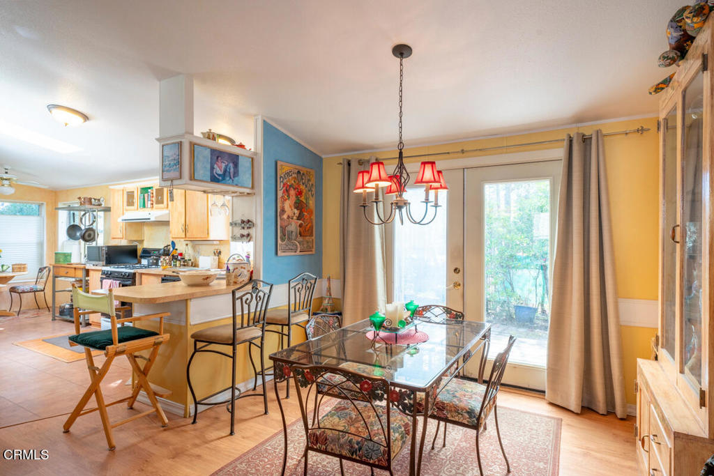 43300 Little River-Airport Road, Unit 90 Little River, CA 95456 - Photo 10 of 21 a view of a dining room with furniture window and wooden floor