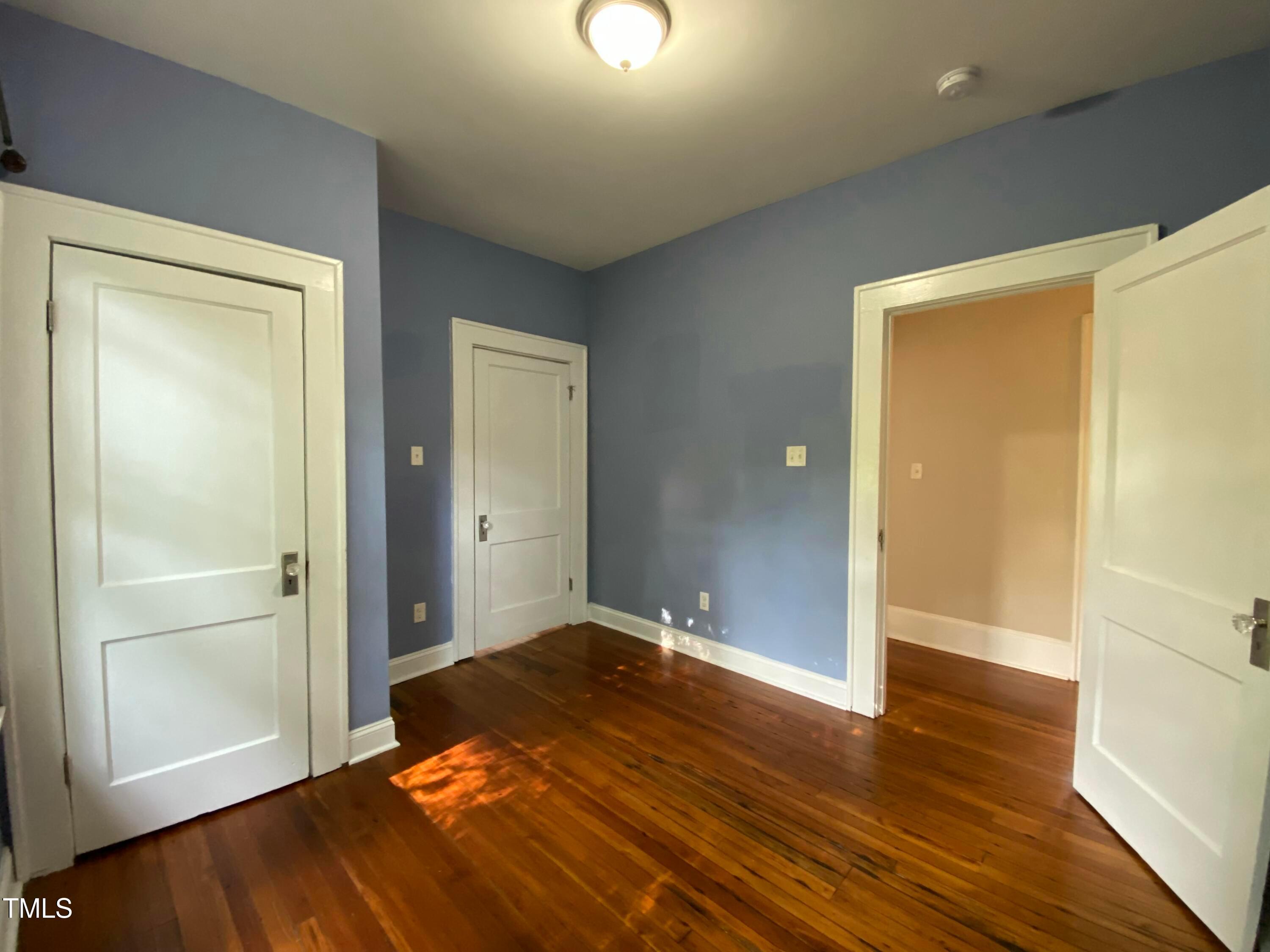 407 Ottawa Avenue Durham, NC 27701 - Photo 16 of 32 a view of a livingroom with wooden floor